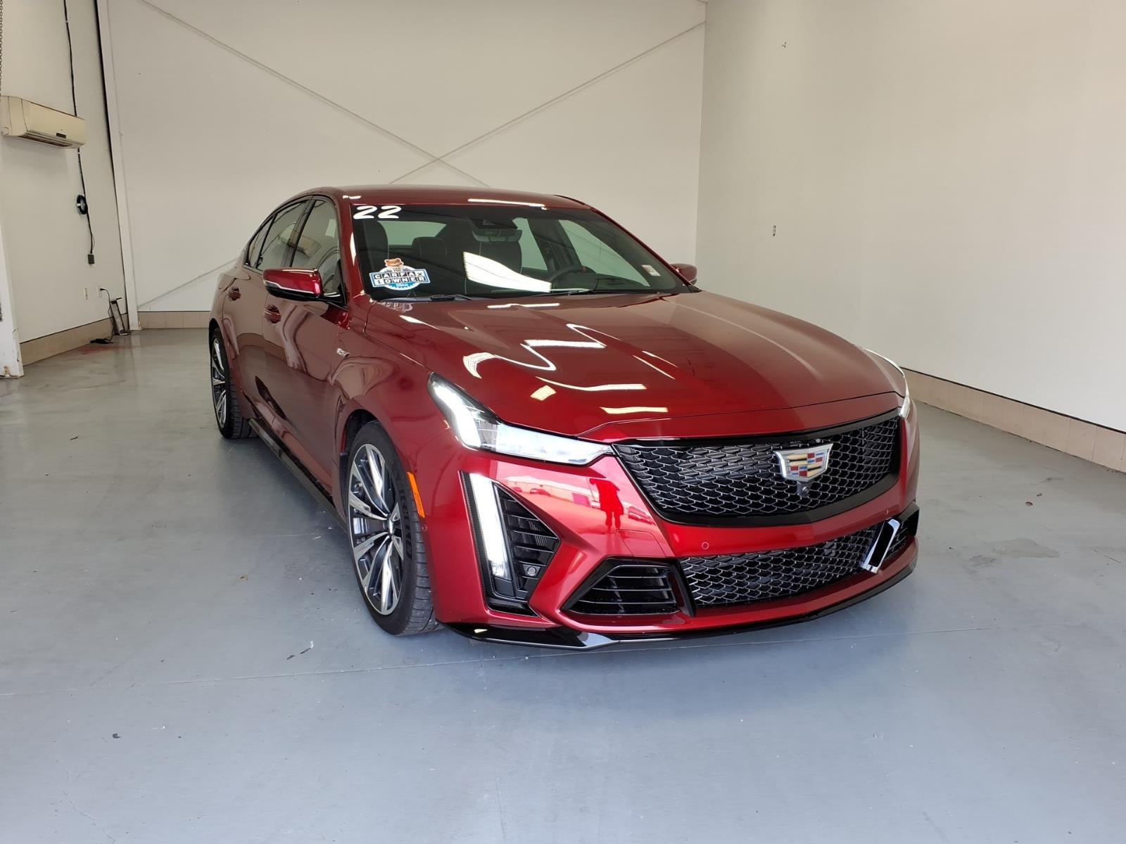 2022 Cadillac CT5-V Blackwing in Infrared Tintcoat (Gsk) — front three-quarter view
