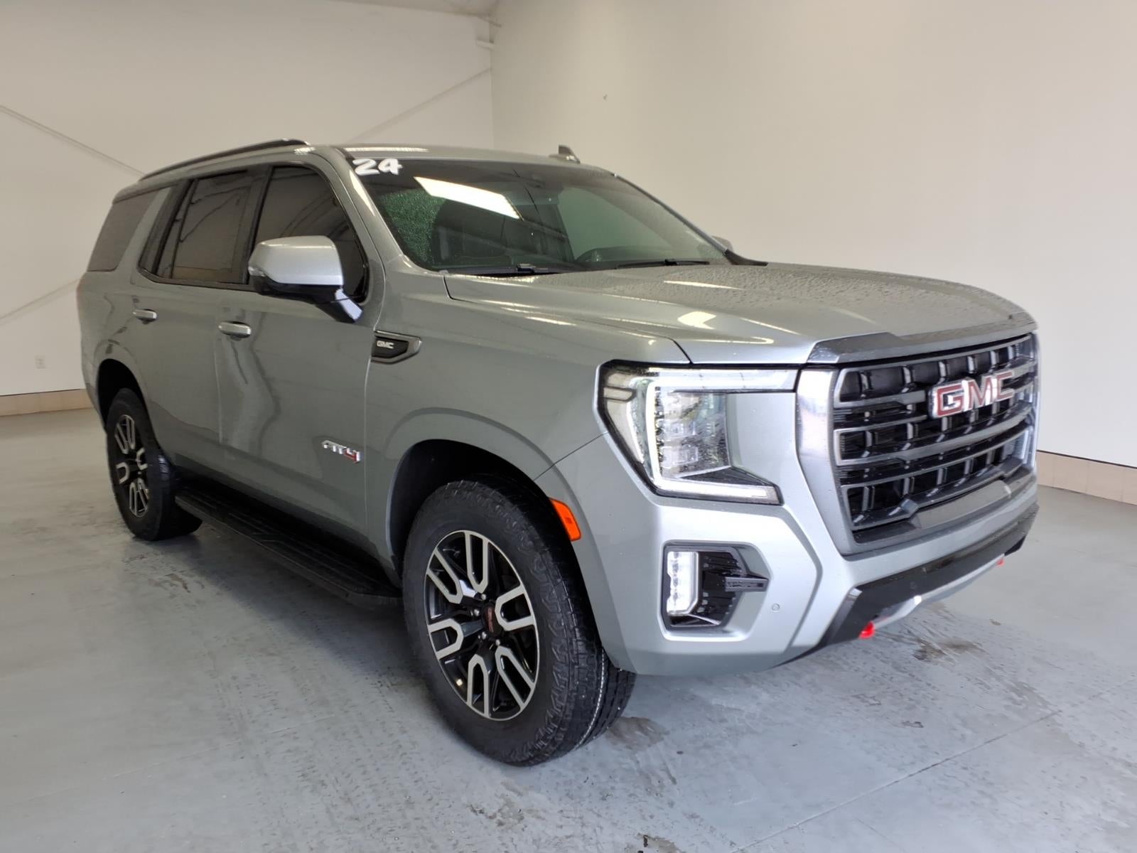 2024 GMC Yukon AT4 in Sterling Metallic (Gxd) — front three-quarter view