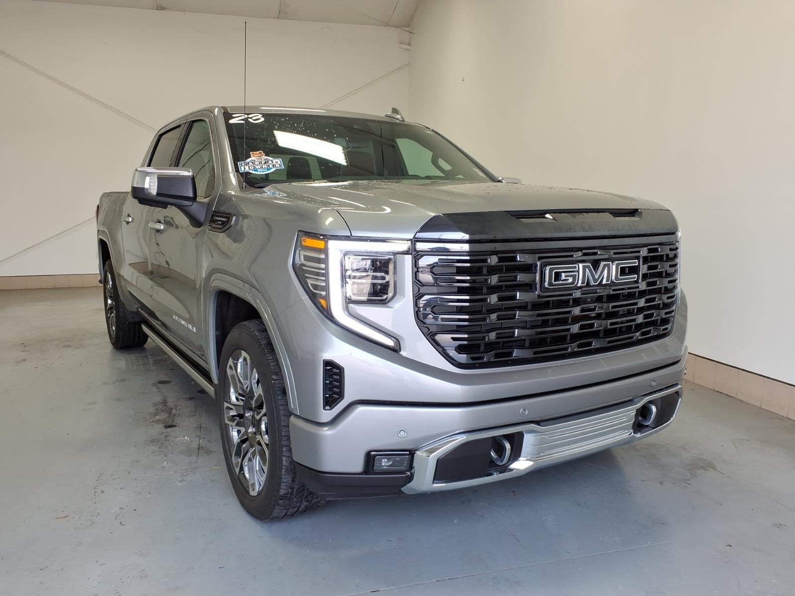 2023 GMC Sierra 1500 Denali Ultimate in Gray — front three-quarter view