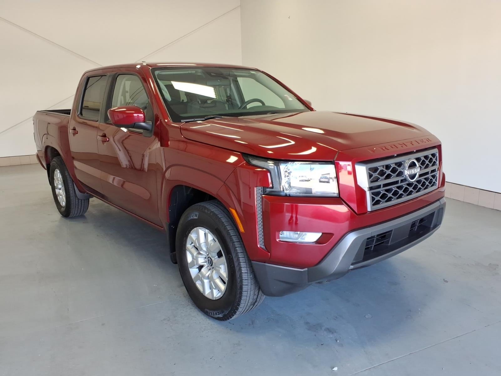2023 Nissan Frontier SV in Cardinal Red Metallic Tricoat (Nby) — front three-quarter view