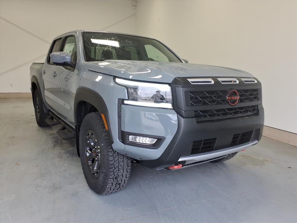 2026 Nissan Frontier PRO-4X in Boulder Gray Pearl Kby — front three-quarter view