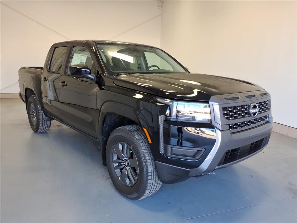 2026 Nissan Frontier SV in Super Black Kh3 — front three-quarter view