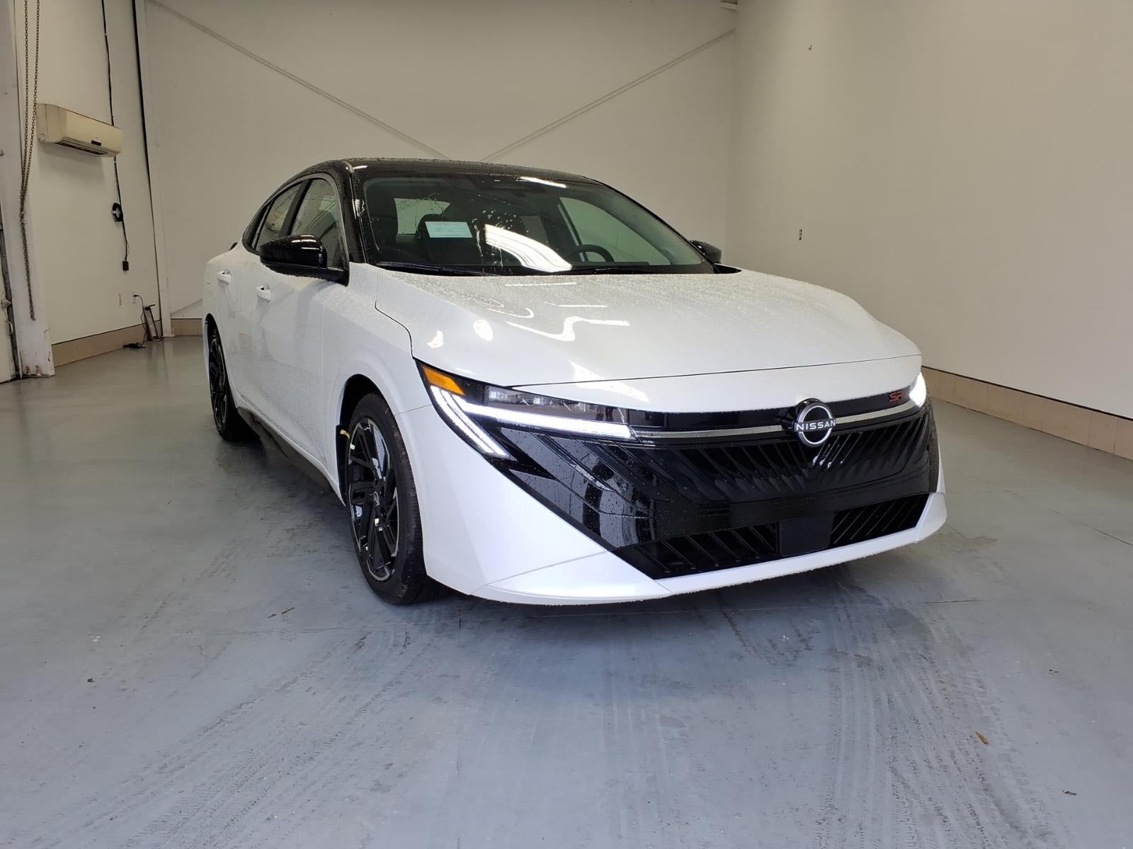 2026 Nissan Sentra SR in Aspen White Tricoat/Super Black — front three-quarter view