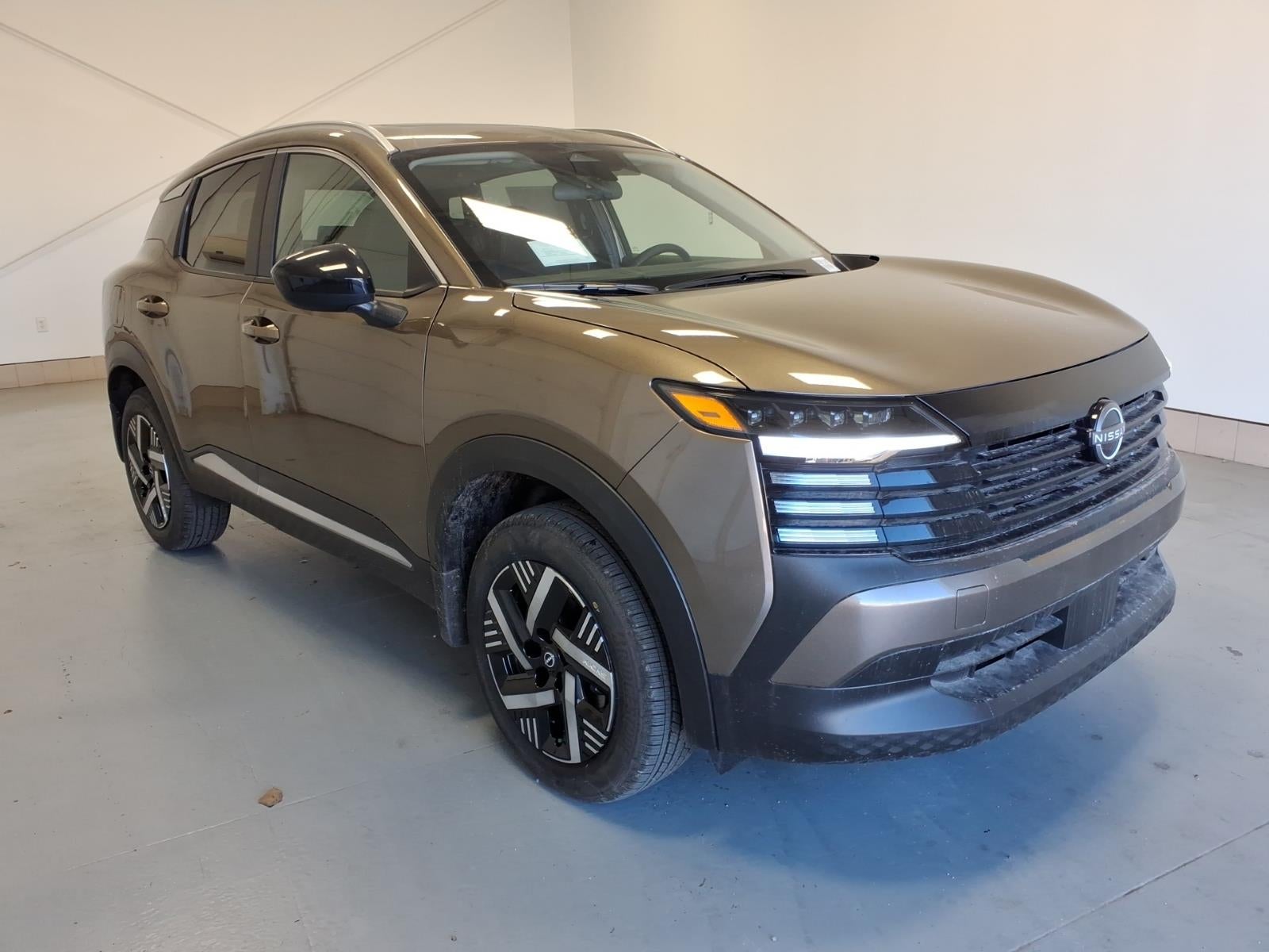 2026 Nissan Kicks SV in Canyon Bronze M — front three-quarter view