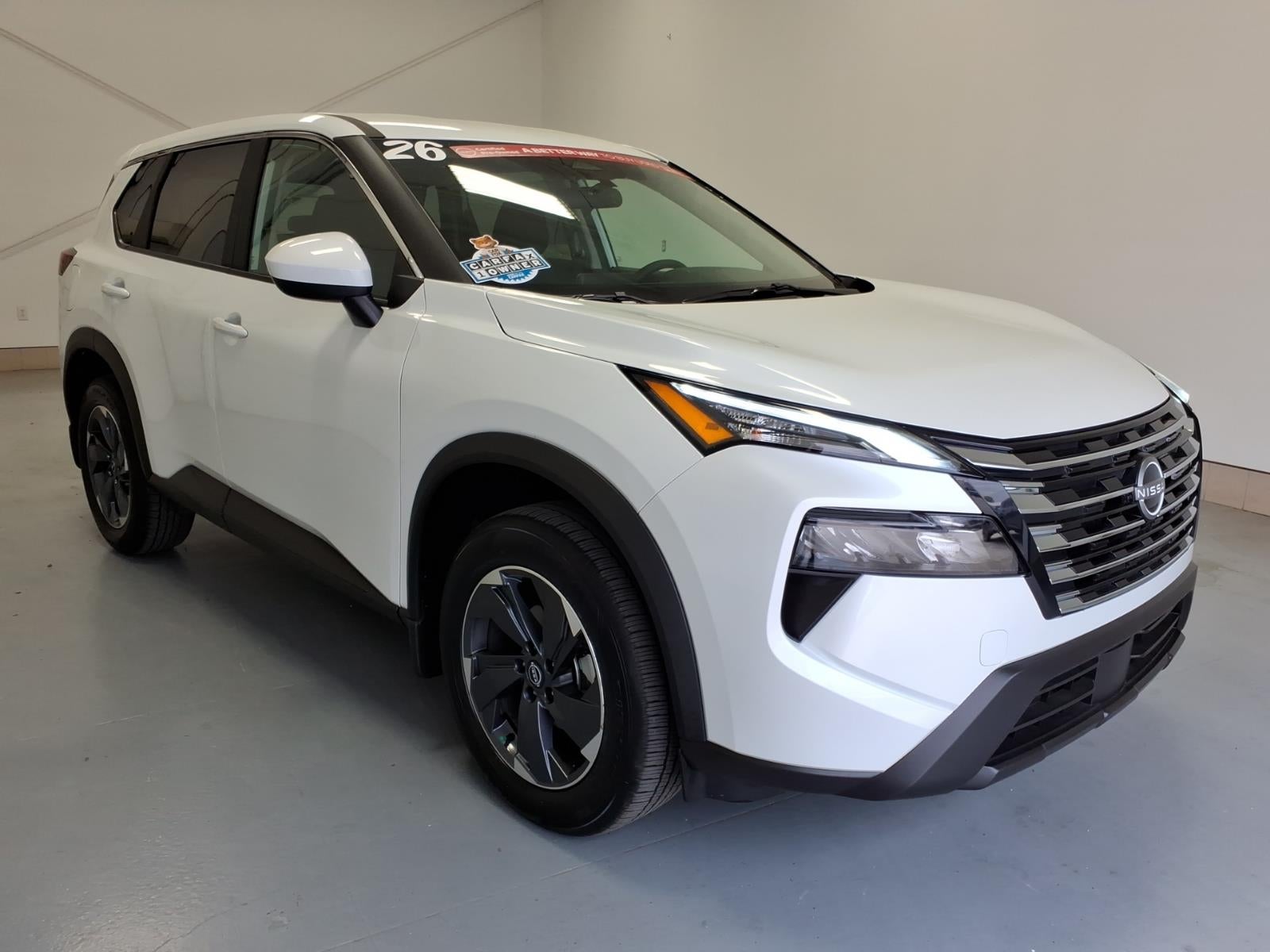 2026 Nissan Rogue SV in Everest White Pearl Tricoat (Qbe) — front three-quarter view