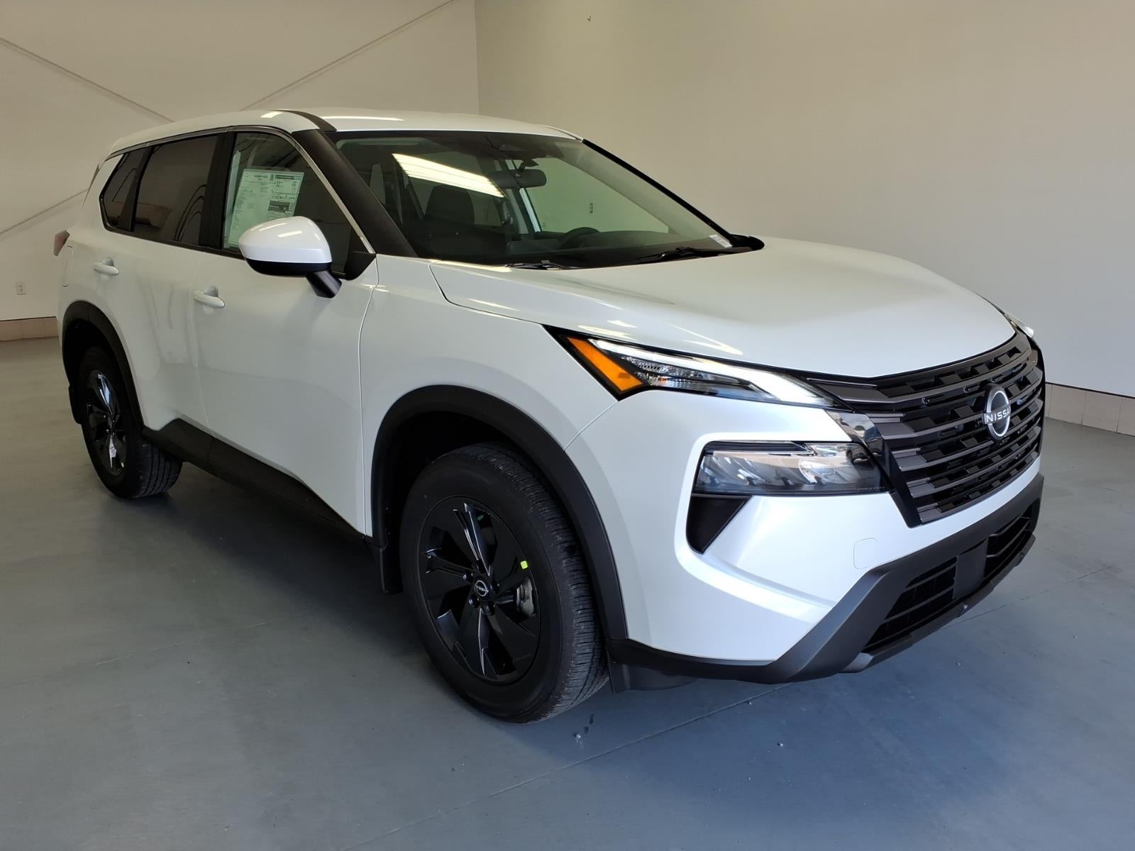 2026 Nissan Rogue SV in Everest White Pearl Tricoat Qbe — front three-quarter view