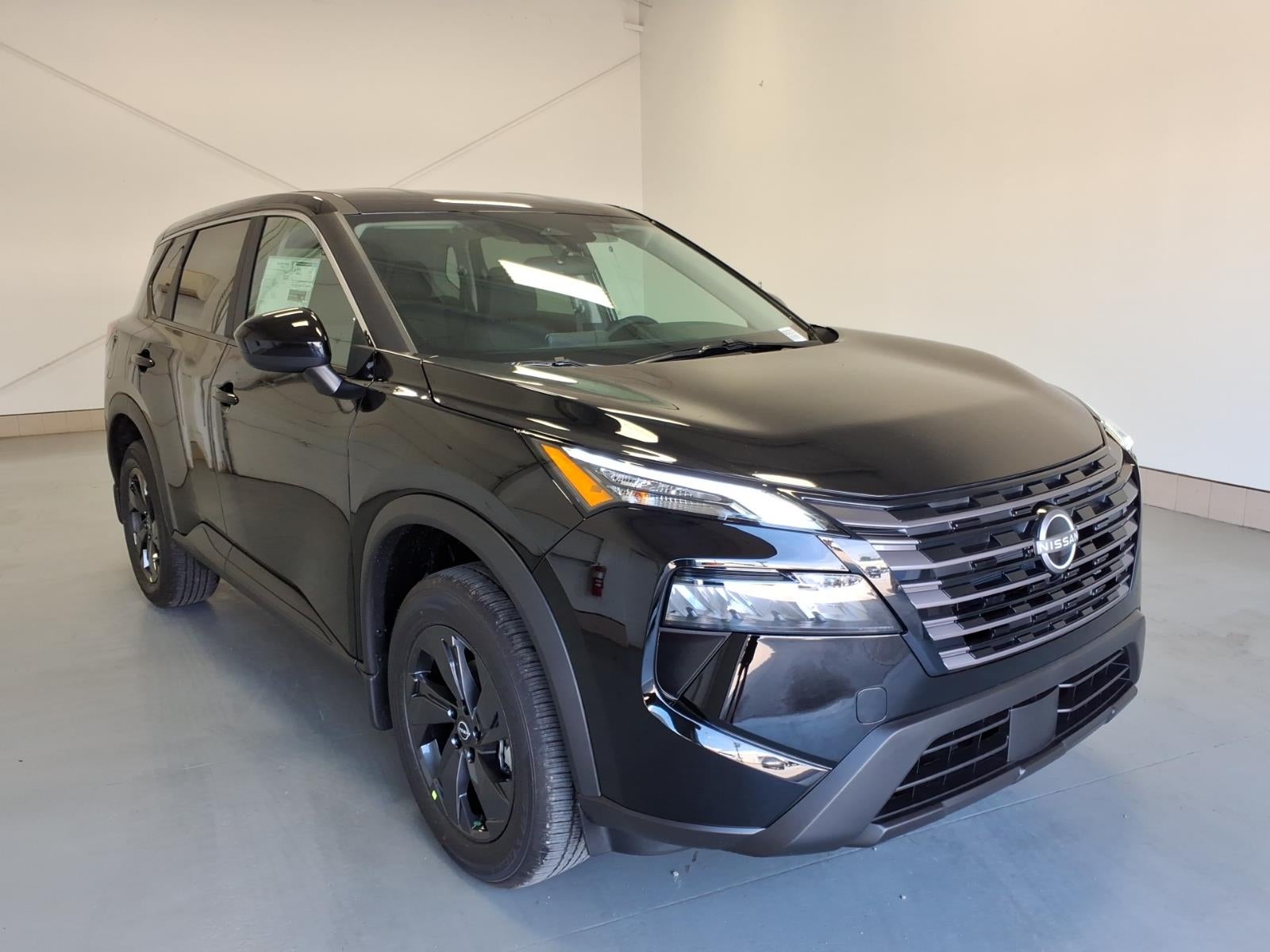 2026 Nissan Rogue SV in Super Black Kh3 — front three-quarter view