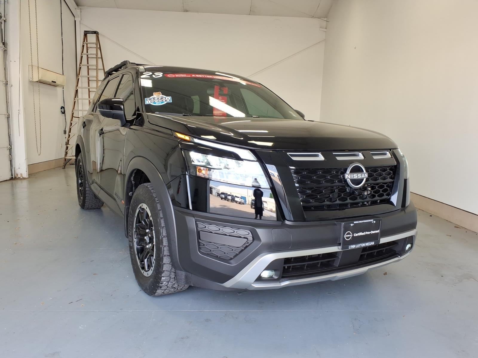 2023 Nissan Pathfinder Rock Creek in Super Black (Kh3) — front three-quarter view