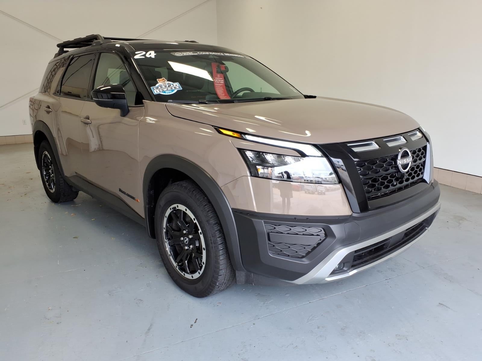 2024 Nissan Pathfinder Rock Creek in Baja Storm Metallic/Super Black (Xkv) — front three-quarter view