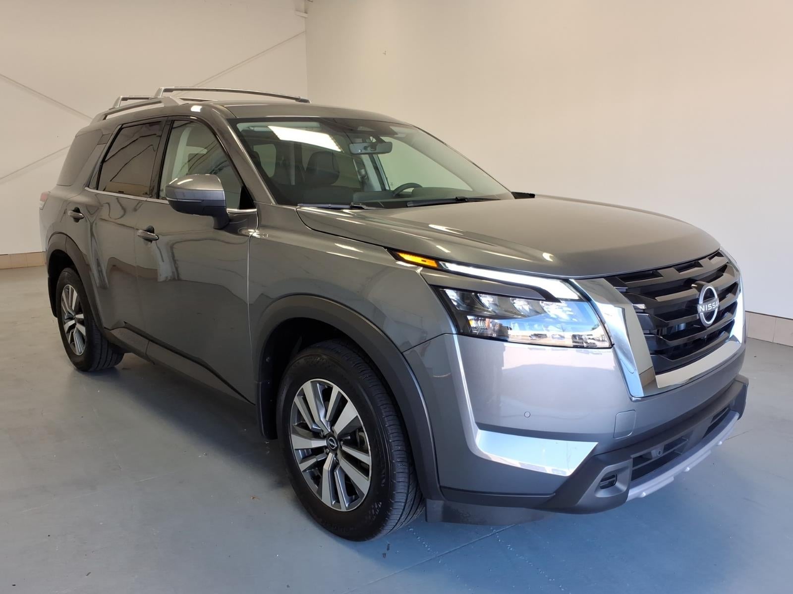 2025 Nissan Pathfinder SL in Gun Metallic (Kad) — front three-quarter view
