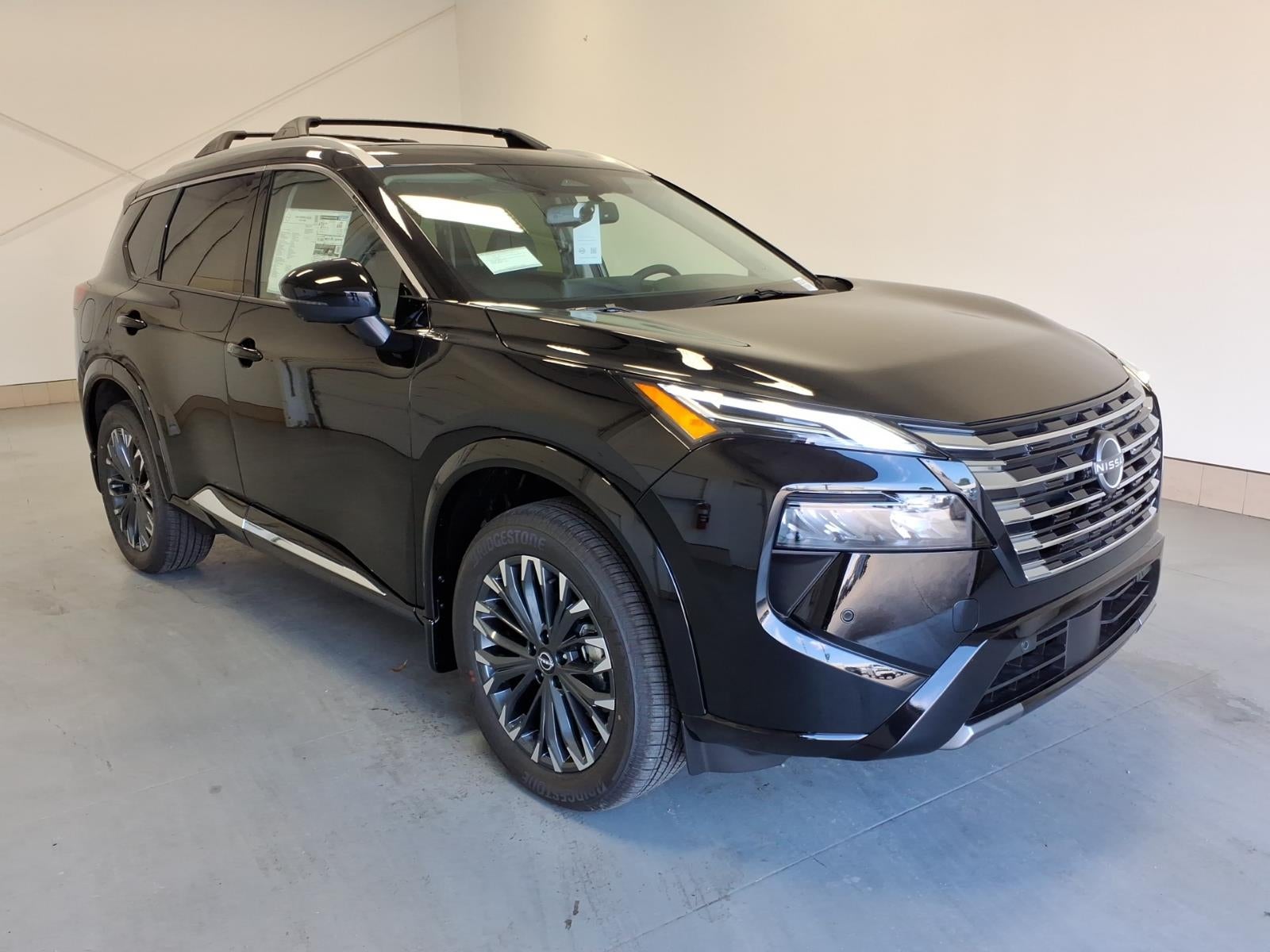 2026 Nissan Rogue Platinum in Super Black Kh3 — front three-quarter view