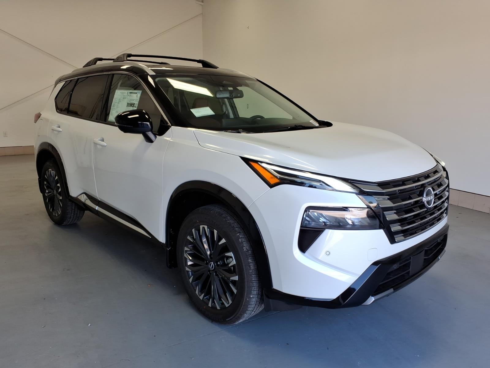 2026 Nissan Rogue Platinum in Everest White Pearl Tricoat Qbe — front three-quarter view