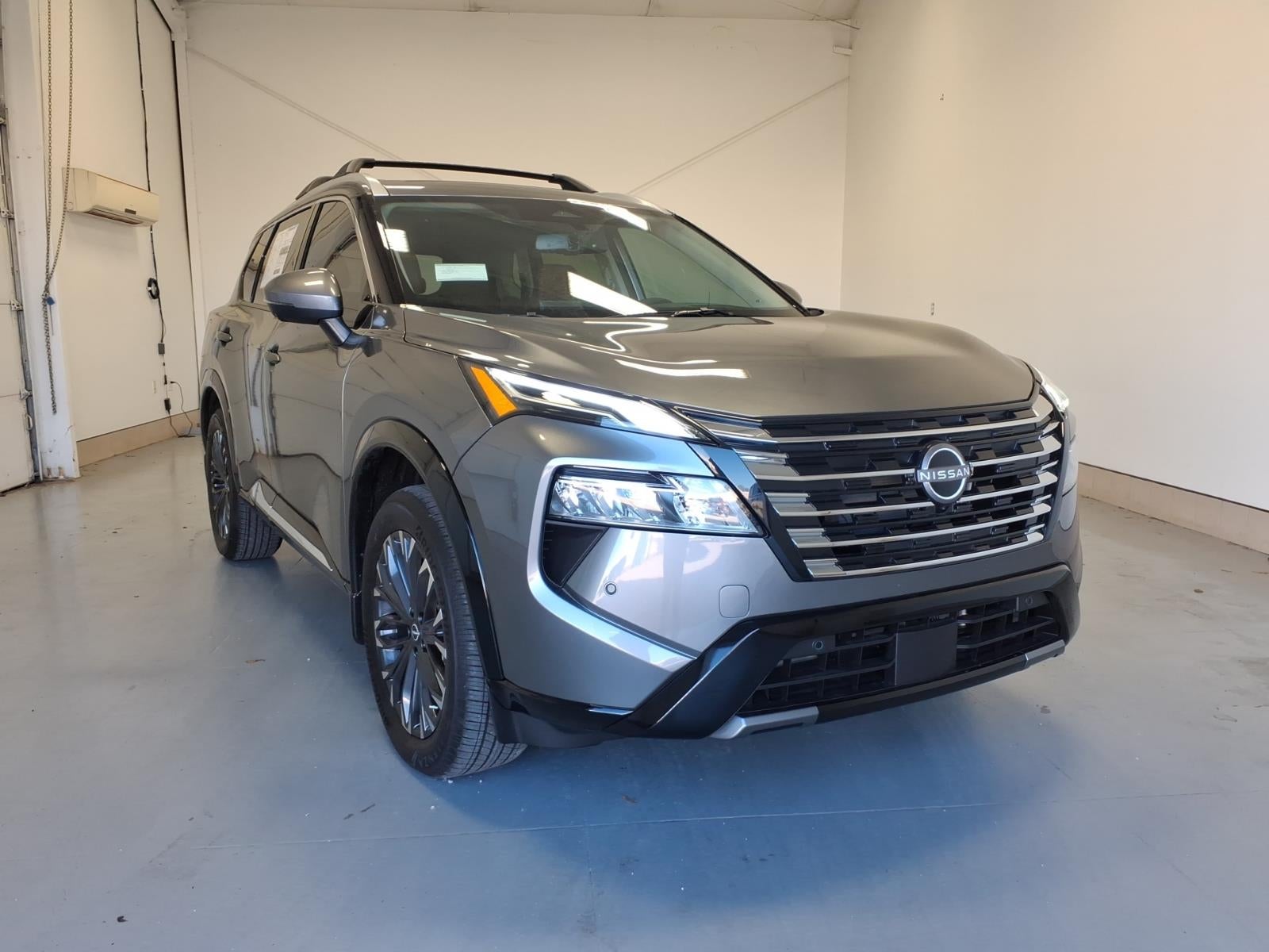 2026 Nissan Rogue Platinum in Gun Metallic Kad — front three-quarter view