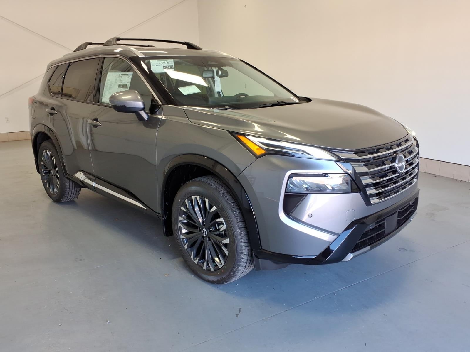 2026 Nissan Rogue Platinum in Gun Metallic Kad — front three-quarter view